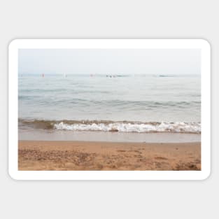 Pastel Blue Waves Washing Onto Sandy Beach in Summer Sticker